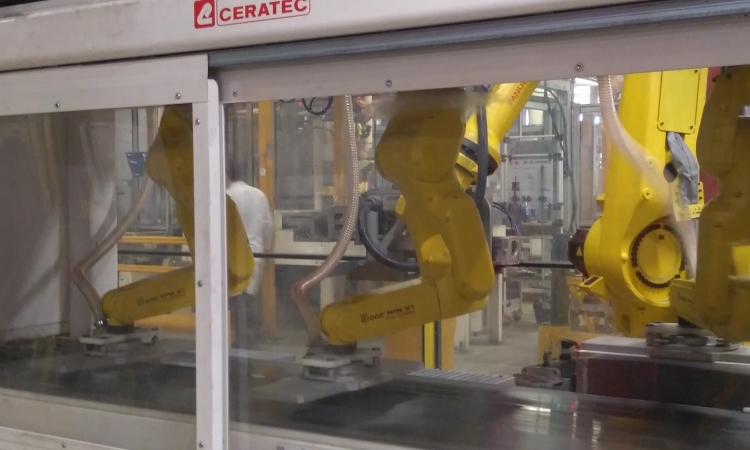 Picking of lead plates via robots with visual tracking