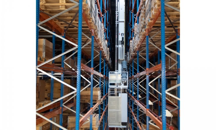 Pallet cranes and shuttle carousel provide intralogistics flow and storage in warehouse